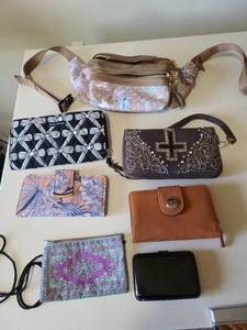lot 2412 image: Fanny pack, wallets, and an Aluma-wallet