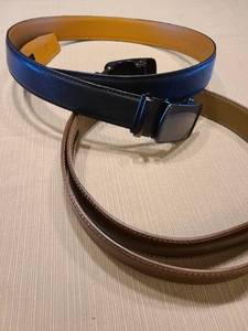 lot 2417 image: Two mens belts, black is 36 and brown is 34