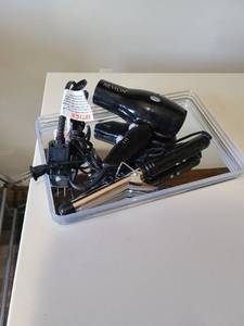 lot 2426 image: Bathroom mirror tray, hair dryer and curling iron