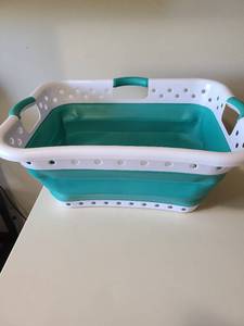 lot 2431 image: Collapsible curved side laundry basket