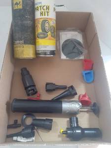 lot 3026 image: Rubber repair kit, patch kit and air pump with attachments