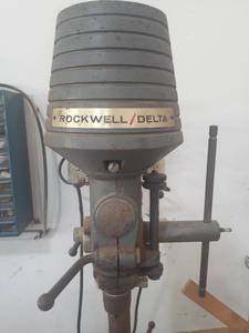 lot 3041 image: RockwellDelta drill press with extra drill bits