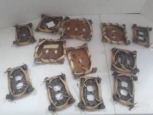 lot 3107 image: Light and outlet covers. Most of them are new. All have antler decor