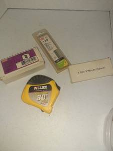 lot 3142 image: Various brads and tape measure