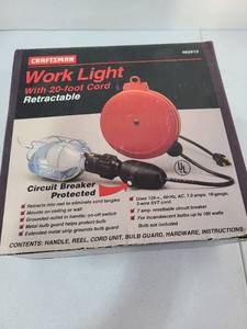 lot 3200 image: Craftsman worklight with 20 foot retractable cord, NIB