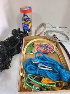 lot 3246 image: Bungees, wire, cargo net, more.