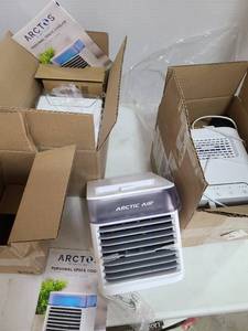 lot 3300 image: Three Arctic Air personal space coolers