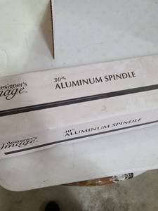 lot 3309 image: Box of 18 black finish 30 inch aluminum spindles