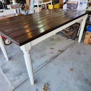 lot 3425 image: Wood table 31 x 72 x 38.5 heavy, very sturdy needs refinished