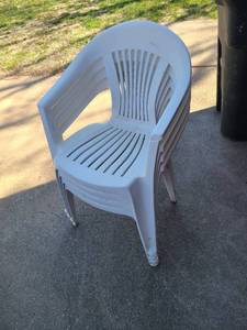 lot 3430 image: Four white plastic patio chairs