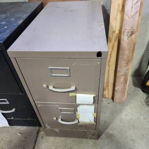 lot 3609 image: Tan filing cabinet 29 x 25 x 15 with templates and drawings