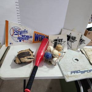 lot 3622 image: Rawlings childs glove, baseballs, bases and Royals 1985 World Series pennent