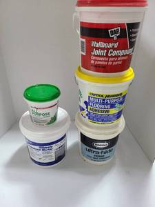 lot 3707 image: Joint compound, flooring adhesive, premixed mortar. None are full.