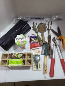 lot 3715 image: Gardening tools and hummingbird nectar