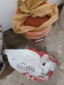 lot 3807 image: 5 gal bucket of floor sweep and partial bag kitty litter