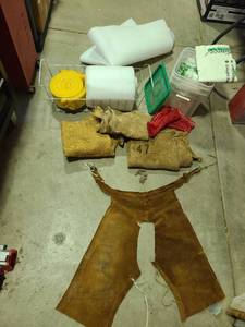 lot 3816 image: Modified leather chaps, burlap, wire basket, foam, mesh bags, bucket