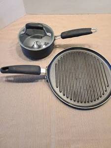 lot 2157 image: Griddle and saucepot
