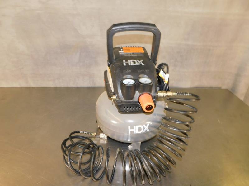 lot 6147 image: HDX Pancake Air Compressor plugged in comes on