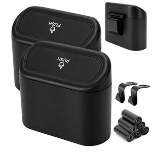 lot 15451 image: Ginsco 2 Pack Mini Car Trash Can with Lid, Small Car Trash Bin, Car Accessories for Interior, Leakproof ABS Car Garbage Bin for Car, Home, Office with Additional 2 Hooks and 90pcs Trash Bags Black