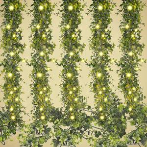 lot 15484 image: XunYee 12 Pieces Eucalyptus Garland with 240 LED Lights String,72 ft Faux Eucalyptus Greenery Garland Fake Leaves Vines for Wedding Baby Shower Garden Home Party Decoration