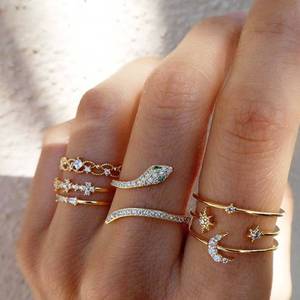 lot 16094 image: WZNBBOY 6Pcs Rhinestone Snake Stackable Knuckle Rings Set Sparkling Crystal Moon Northstar Finger Rings Adjustable Snake Open Rings Vintage Statement Dainty Iced Out Rings Set for Women