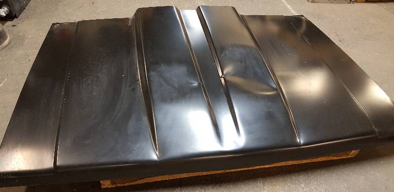 lot 6154 image: New but Wrinkled all steel cowl hood for the 1973 thru 1980 full size Chevy or GMC pick up trucks