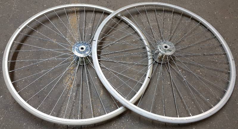 lot 6161 image: Pair of 35 OD  58 spindle bearings high speed spoke wheels and hard rubber tires