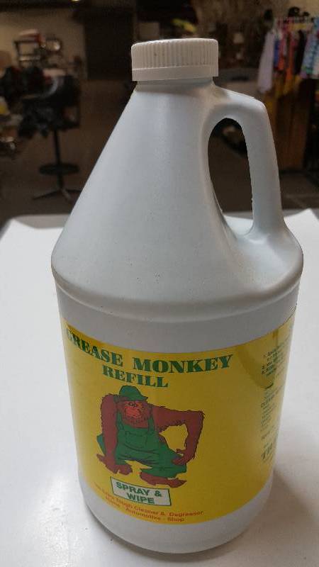 lot 6319 image: Full gallon for bottle refills of the Grease Monkey spray and wipe universal cleaner.  Great stuff for tires or anything else that gets dirty.