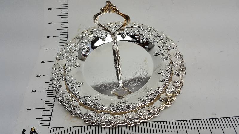 lot 6439 image: I believe its new and some kind of candy or nuts dish with ornate looking edges.
