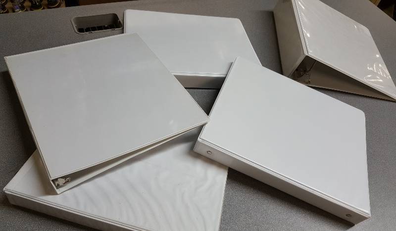 lot 6624 image: Set of 5 total 3 ring notebooks with clear pockets inside of each cover.  One is a 3 back and the others are 1-18.