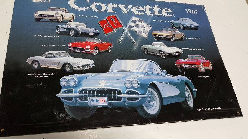 lot 6109 image: 16 X 10 metal Corvette garage sign.  Has a corner thats been bent or wrinkled slightly