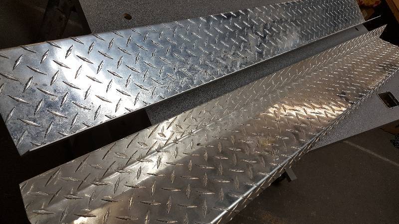 lot 6114 image: New universal aluminum diamond tread running boards.  58 long and 6 deep not brackets included