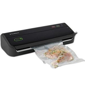 lot 37491 image: FoodSaver Vacuum Sealer Machine with Starter Vacuum Seal Bags & Rolls, Safety Certified, Black - FM2000-FFP - Retail $107.84
