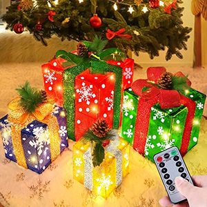 lot 37497 image:  Extra Large 12-10-8-7  4 Pack 70 LED Lighted Gift Boxes Christmas Decor Timer 8 Modes Remote Battery Operated Light up Snowflakes Present Box Indoor Outdoor Christmas Tree Decorations Home Yard
