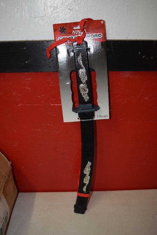lot 1 image: 12 Ninja Combat Toy Swords