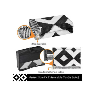lot 2379 image: Laura Benasse White Black Outdoor Plastic Straw Rug Geometric Waterproof Reversible 6 x 9 Rectangle - White-Black