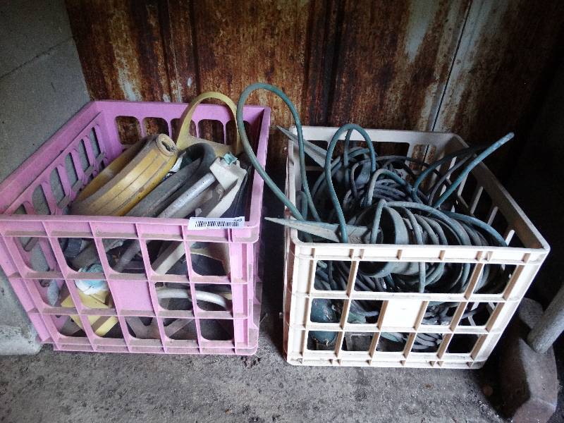 lot 489 image: Sprinklers, extension cord & a sledgehammer.