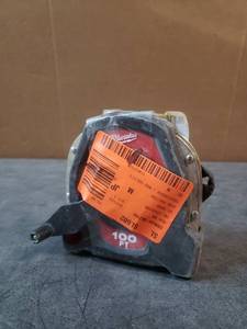 lot 4834 image: Milwaukee 100 ft. Closed Reel Long Tape Measure.