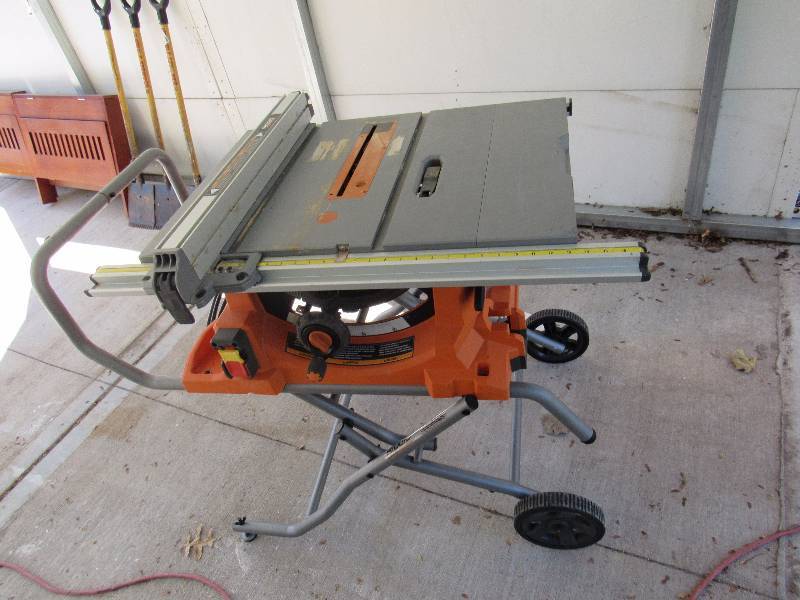 lot 1212 image: Ridgid 10 Heavy-Duty Portable Table Saw With Folding Stand
