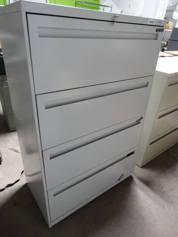lot 162 image: HON 4 drawer lateral file cabinet w key