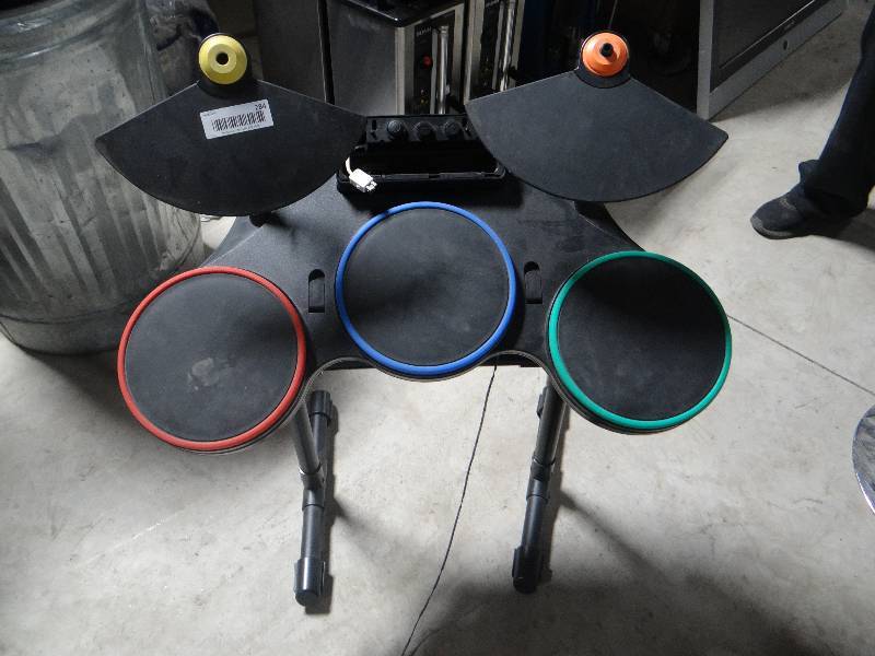 lot 284 image: Guitar hero drum set