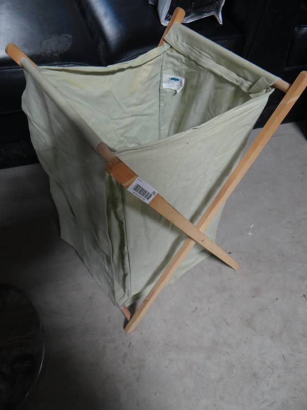 lot 291 image: Clothes hamper, alarm clock, light bulbs, misc
