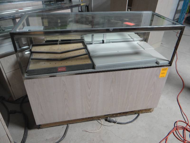 lot 354 image: 4 ft showcase w storage drawers