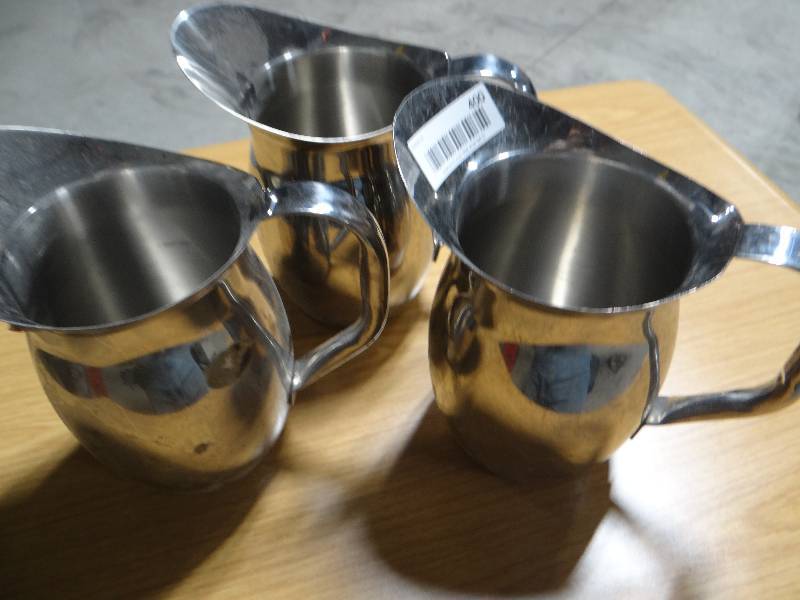 lot 400 image: 3 stainless water pitchers