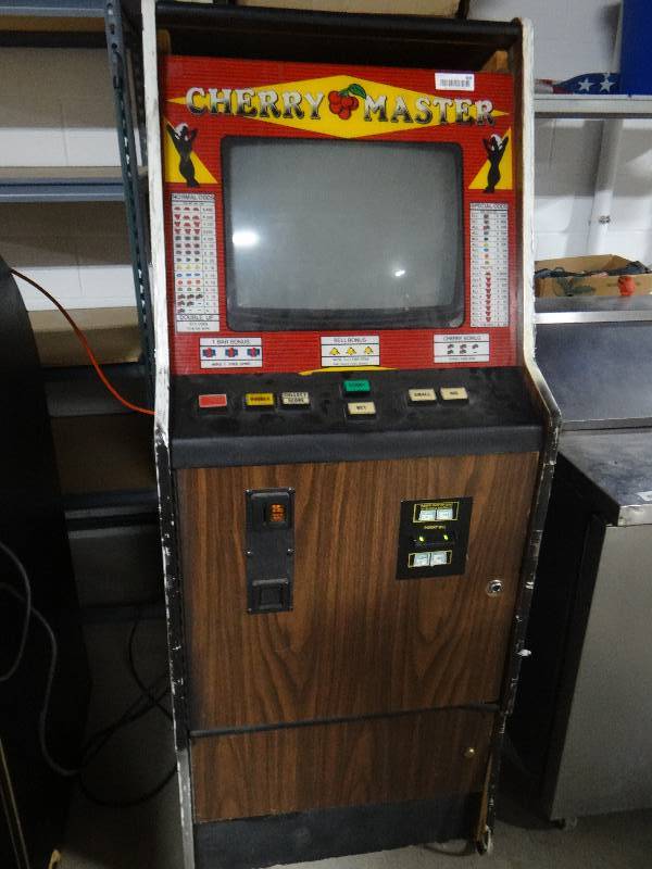 lot 408 image: Cherry masters arcade game w dollar acceptor