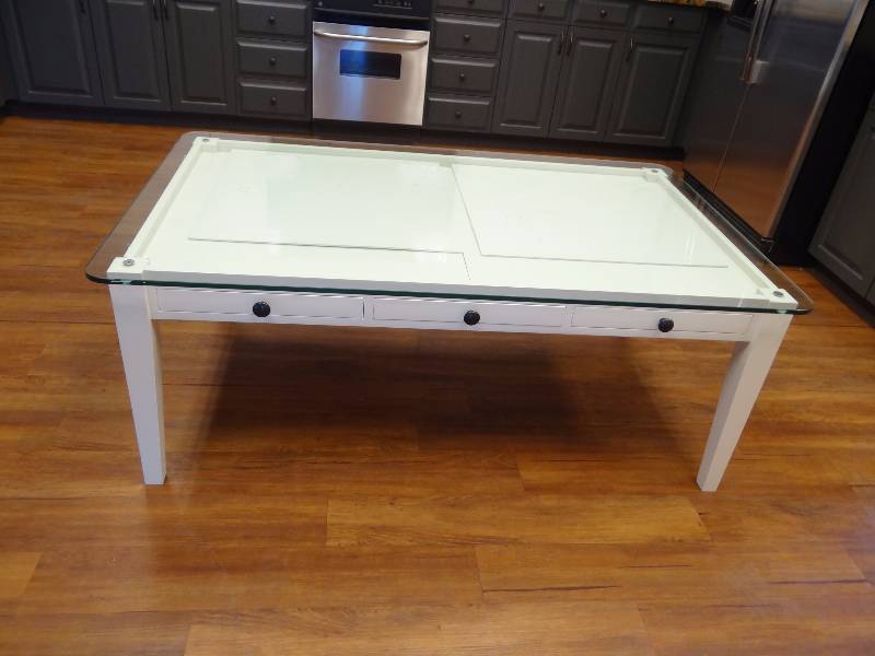 lot 5579 image: 60 X 36 Glass Top Artesian Style Coffee Table