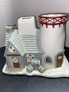 lot 44511 image: Tea Light Cottage and Ceramic Pirate