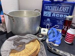 lot 44527 image: Camping Supplies - fork set, picnic plates, pot, cushion, flip flops, flask, travel mugs