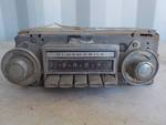 Old Oldsmobile car radio with knobs