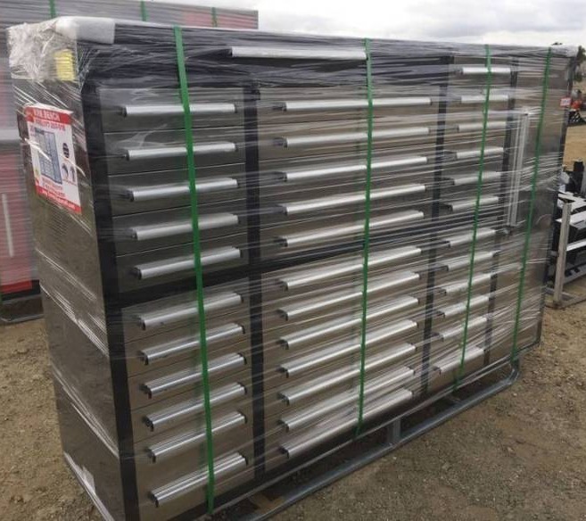 lot 1134 image: Unused 2024 Steelman 7FT-35D Stainless Steel Work Bench with 35 Drawers &amp 1 Cabinet.